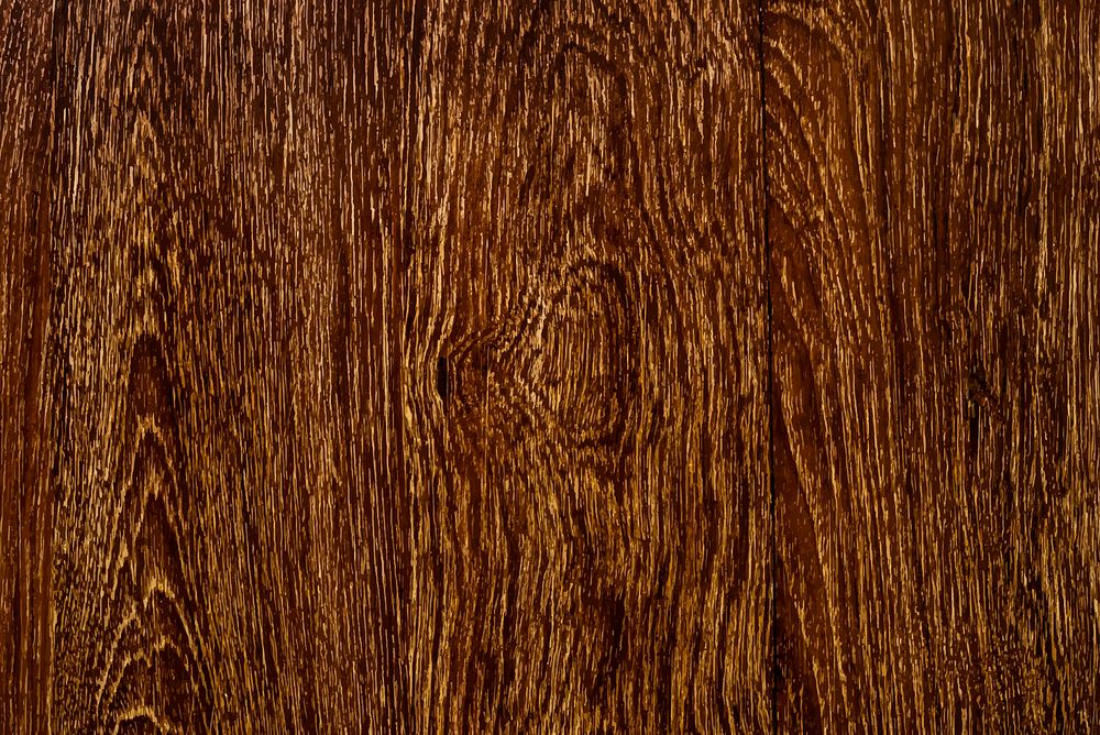 Close up of a brown wooden floorboard textured background