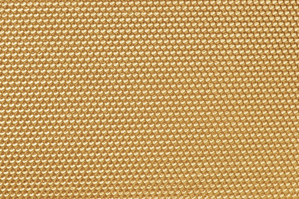 Golden colored honeycomb pattern wallpaper