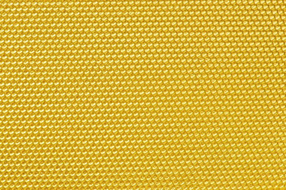Golden colored honeycomb pattern wallpaper