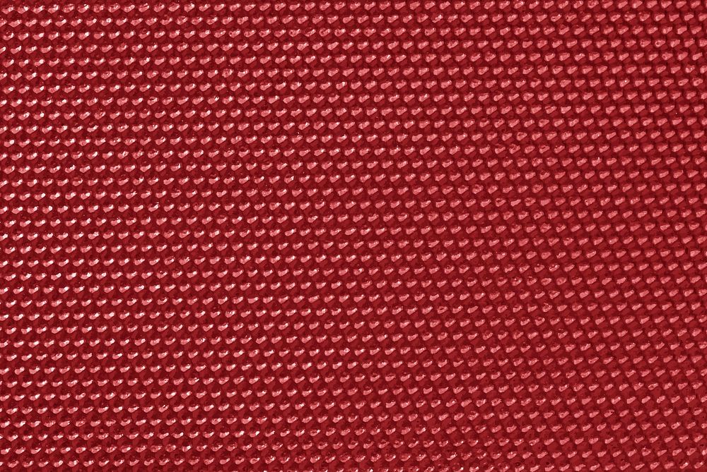 Red colored honeycomb pattern wallpaper vector