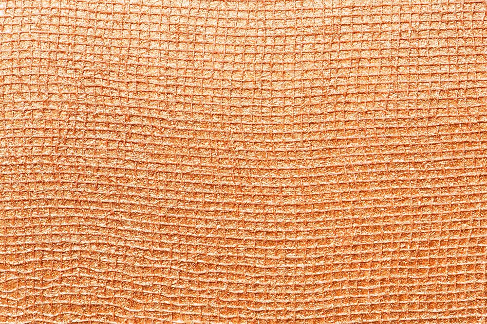 Shiny orange surface textured background
