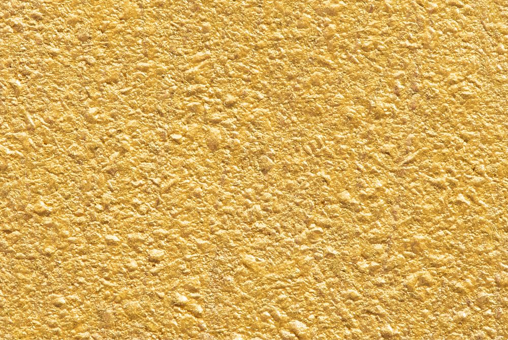 Shiny gold textured paper background vector