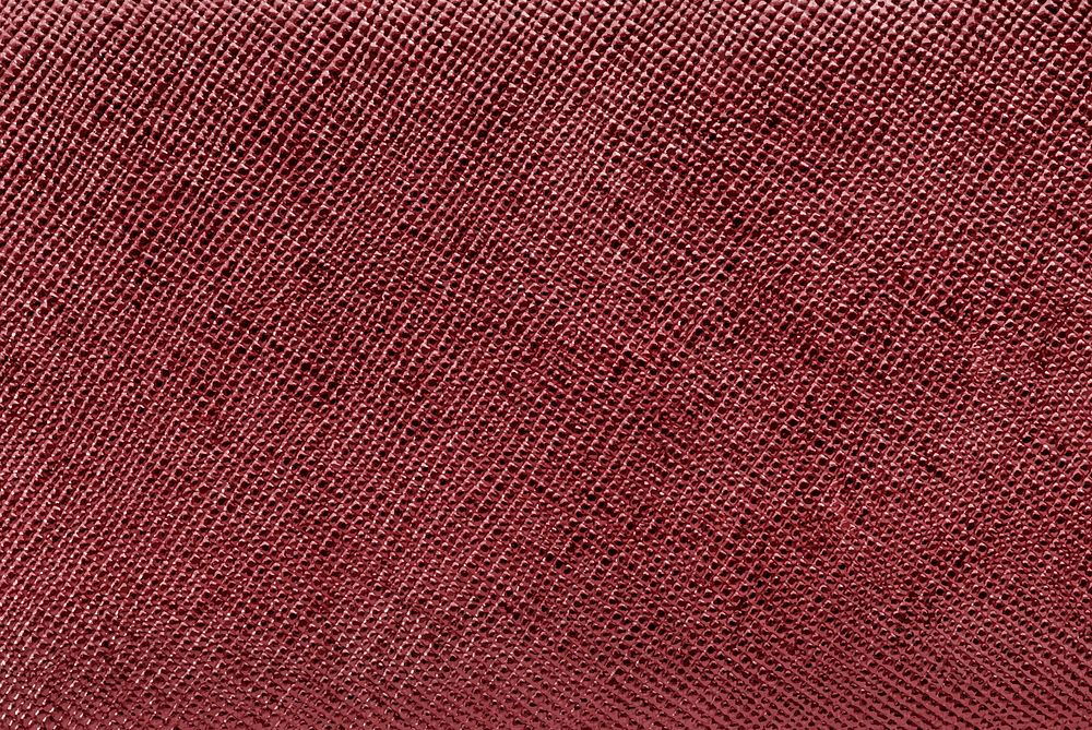 Shiny burgundy red textured paper background