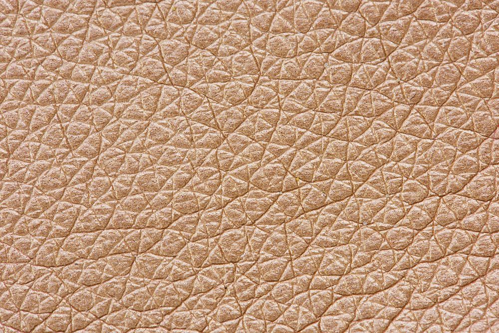 Rose gold leather textured background