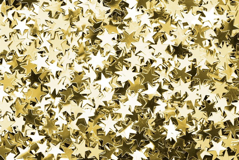 Shiny golden stars glitter festive background
