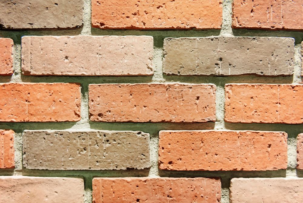 Orange brick wall textured wallpaper vector