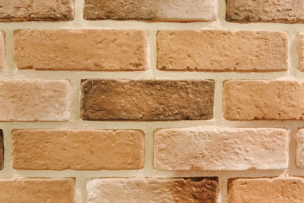 Brown brick wall textured wallpaper vector
