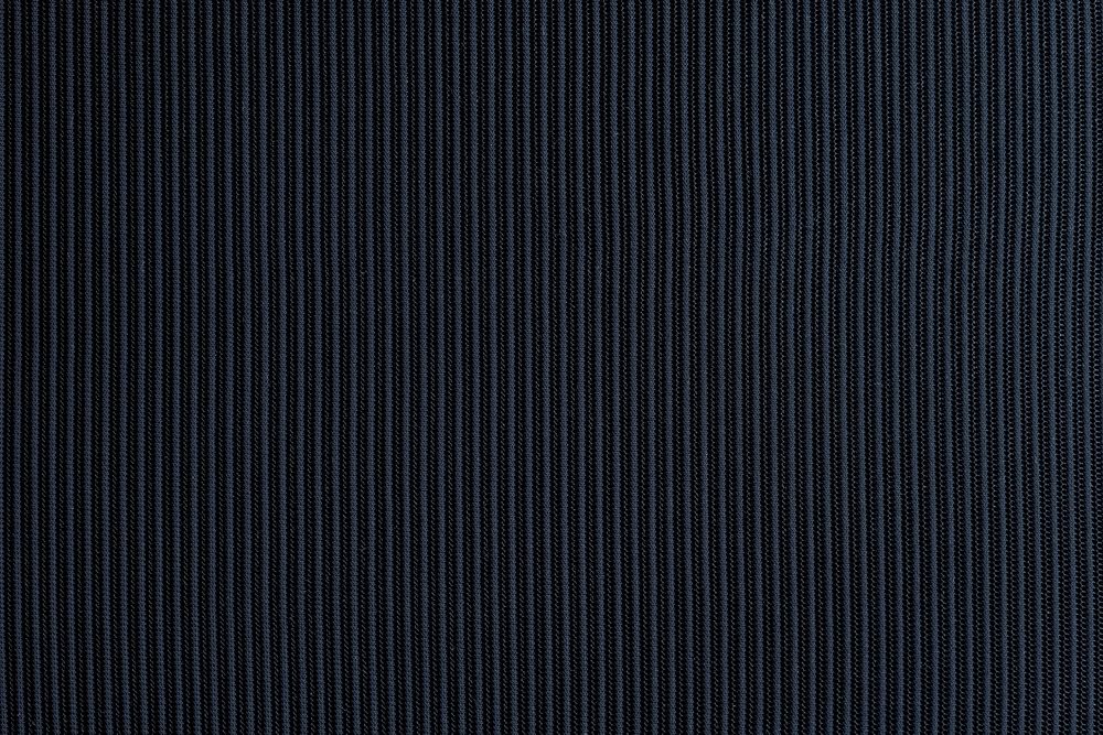Navy blue corrugated fabric textured background