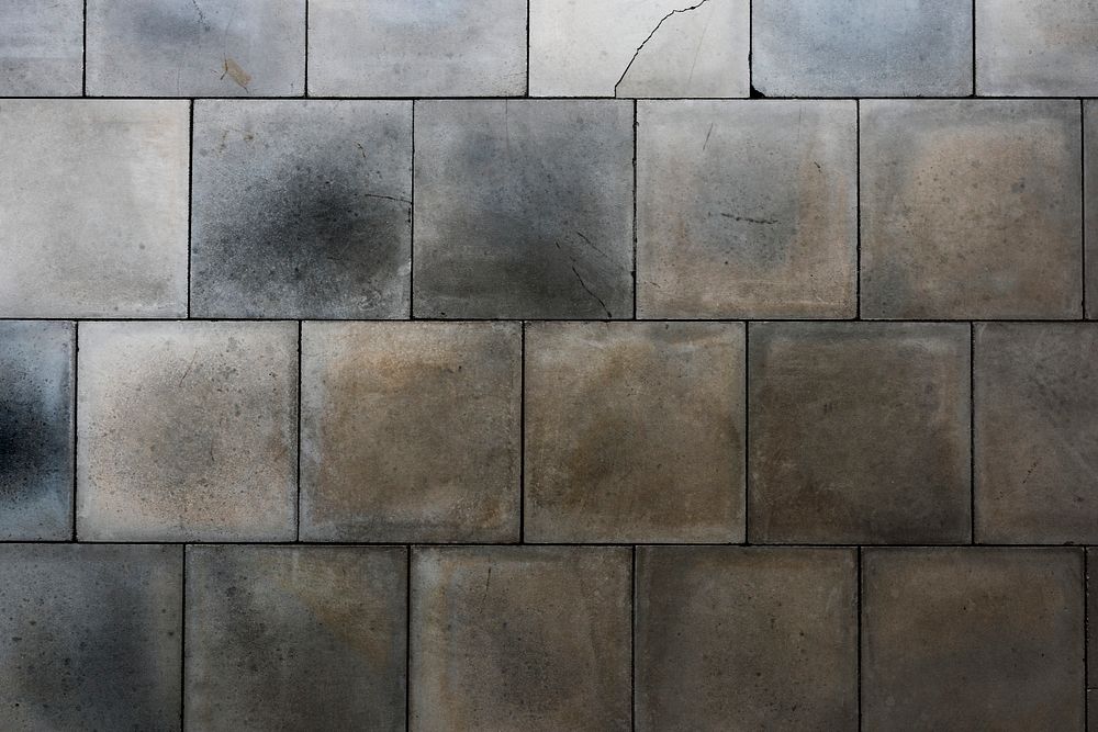 Grunge gray and white tiles textured background
