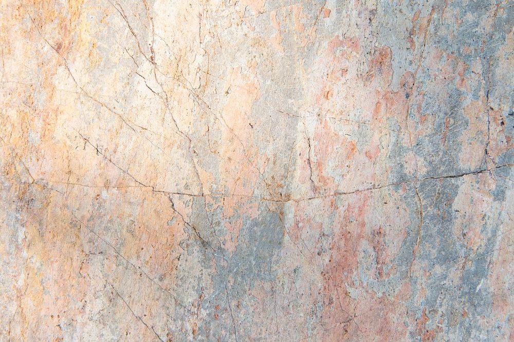 Cracked pastel color cement textured background
