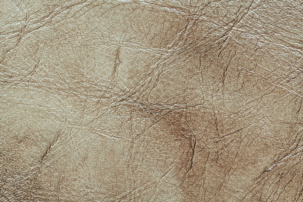Beige brown leather textured background