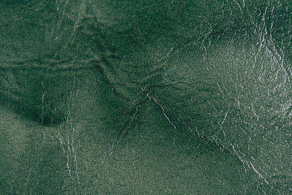 Dark green leather textured background