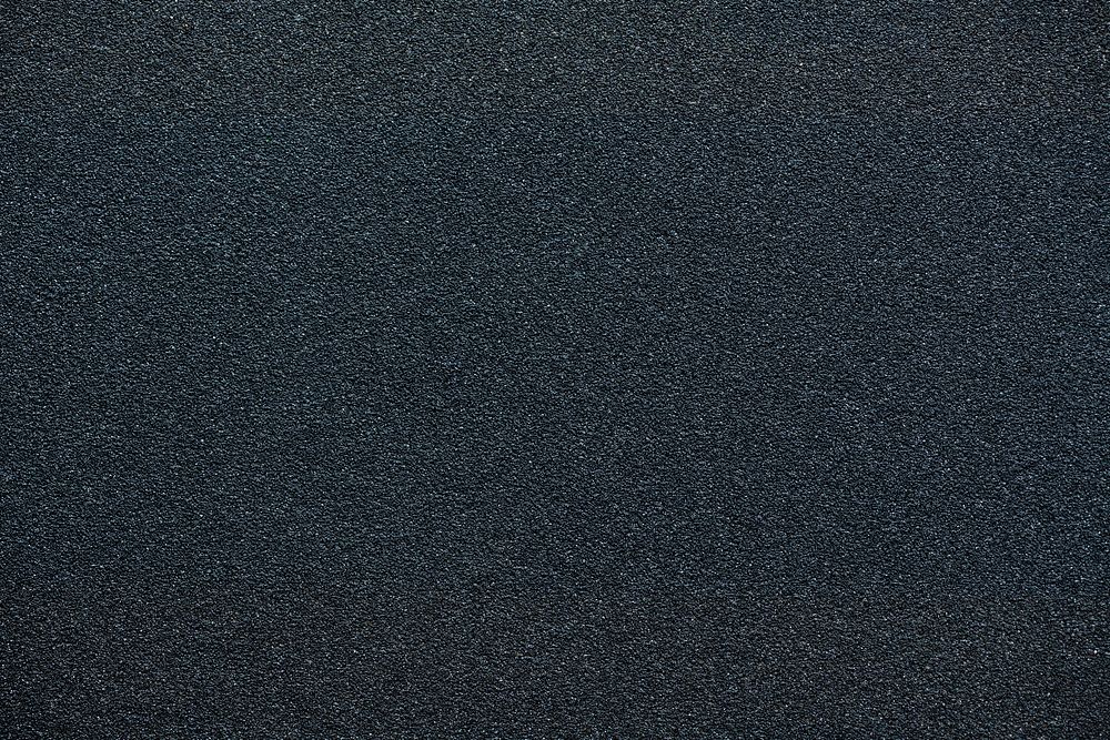 Black sandpaper surface texture background