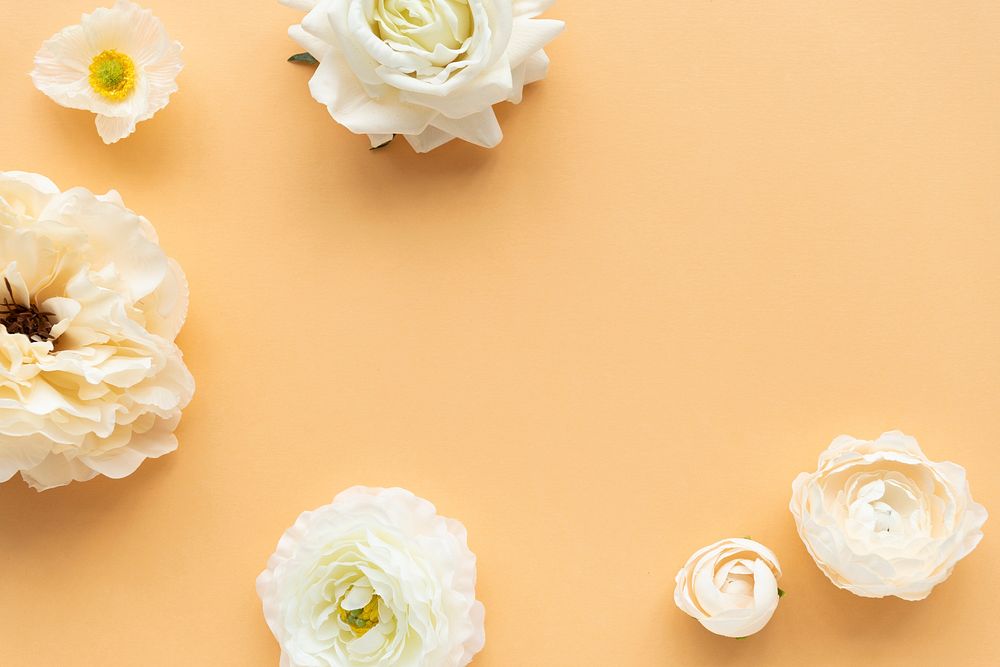 White flowers pattern on orange background