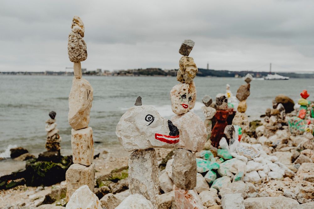 Stone art creations by the coastline Photo rawpixel