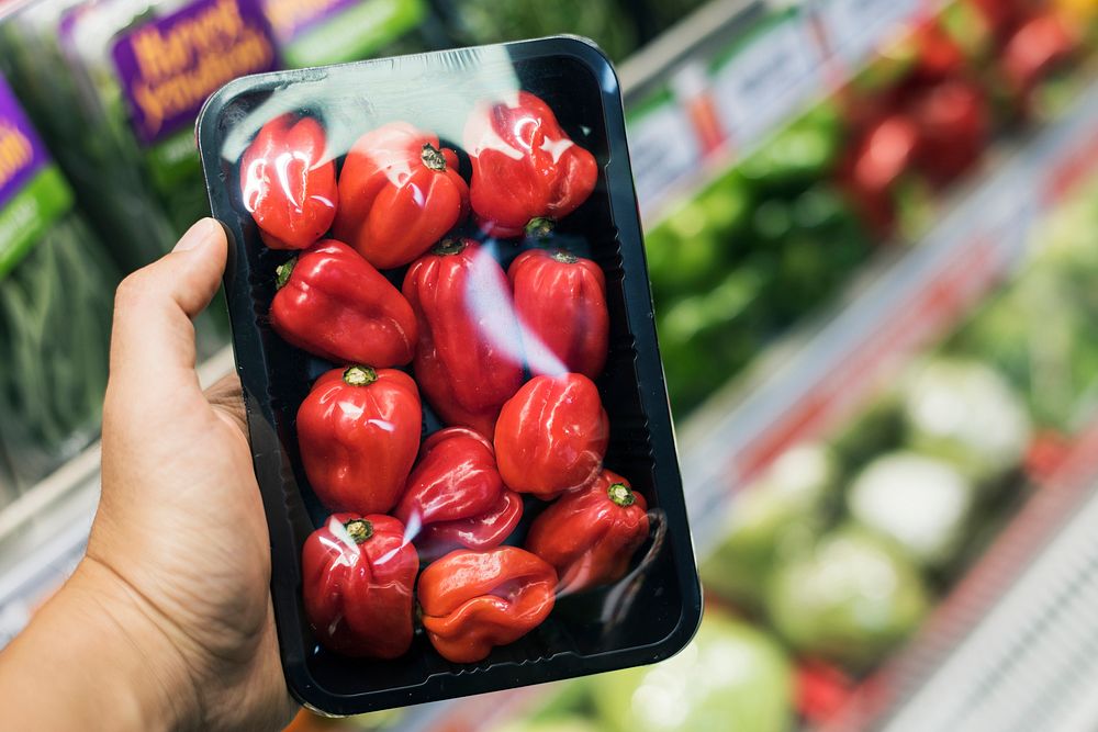 A pack of bell peppers in a super market