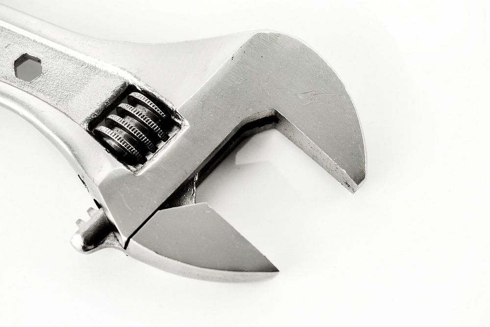 Macro shot of adjustable wrench isolated on whtie background