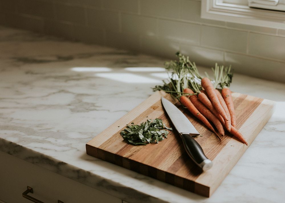 Fresh organic carrots on a cutting board