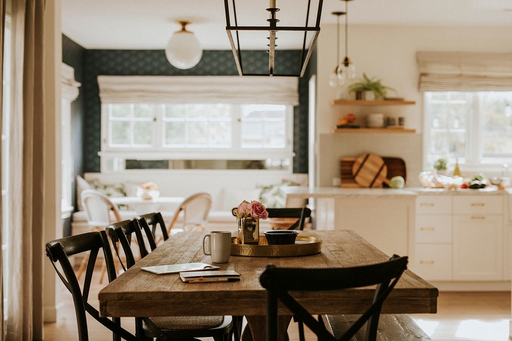 Golden kitchen tray on a wooden dining table