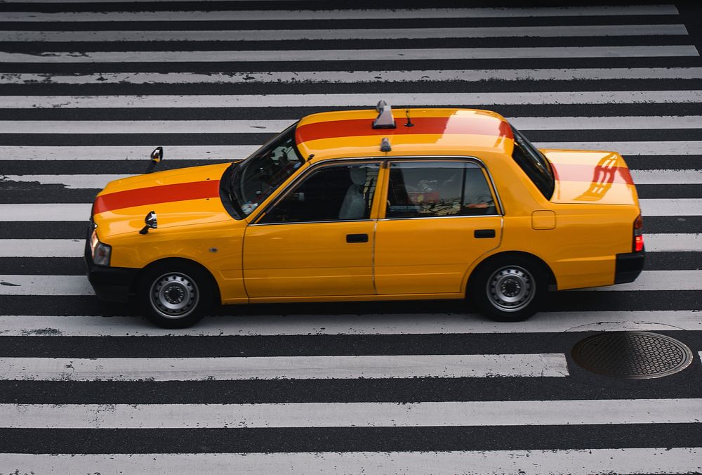 Yellow taxi in a city