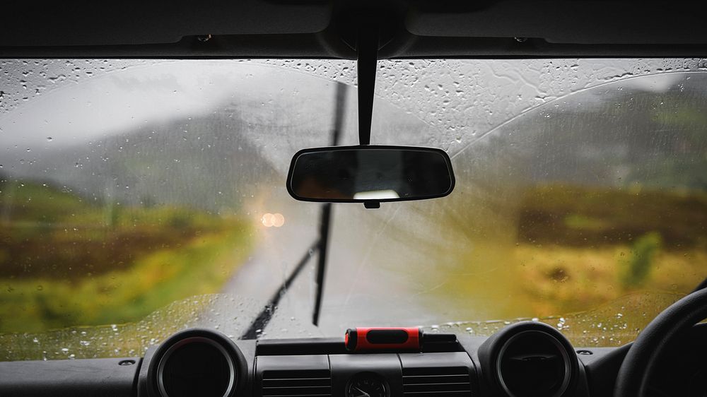 Adventure desktop wallpaper background, view of a rainy day from inside the car