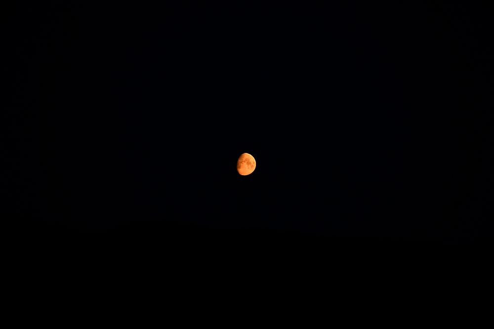Red moon in a night sky