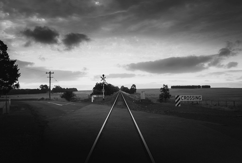 Railroad in the countryside in grayscale