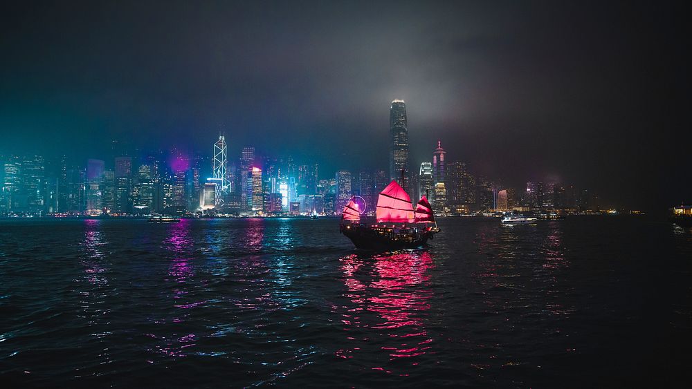 Travel desktop wallpaper background, Junk ship sailing in a Victoria Harbor, Hong Kong