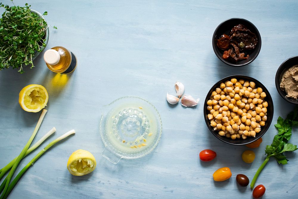 Chickpeas and young sunflower vegetable in the kitchen