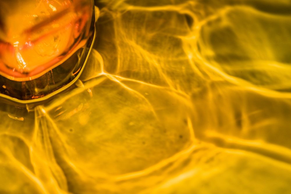 Yellow abstract light reflection background