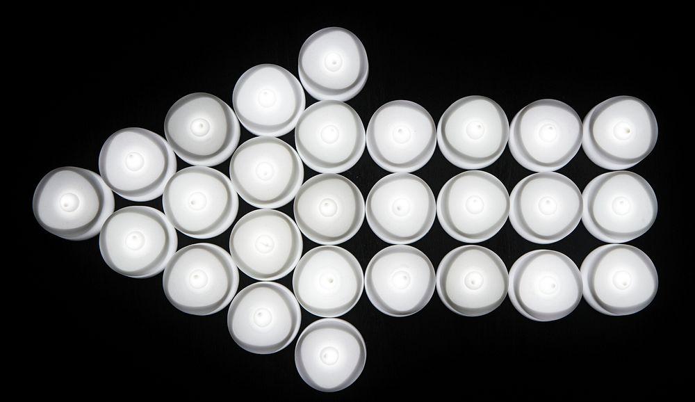 White light bulbs arrow shape