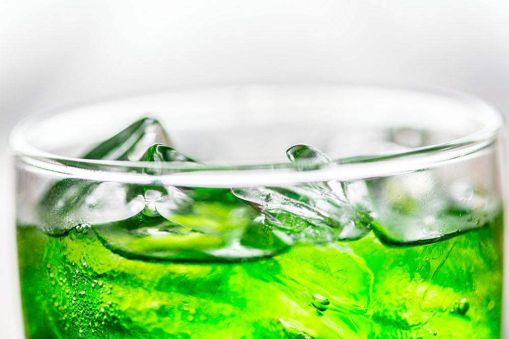 Green soda drink macro shot