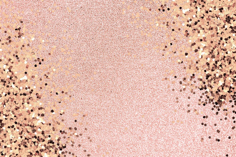 Gold glitter confetti on a pink background