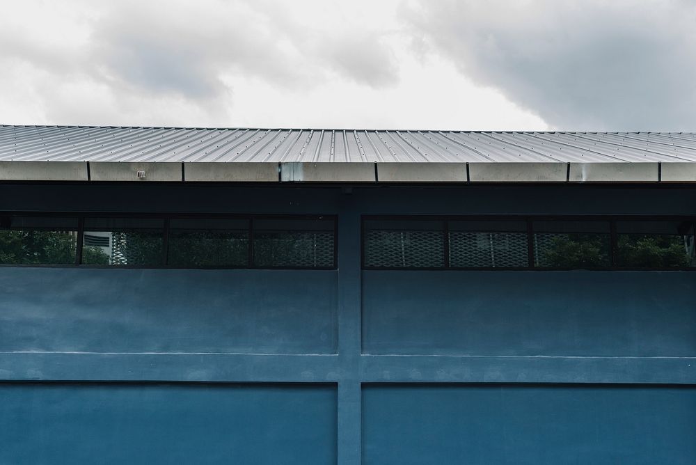 Blue wall and roof of a building exterior