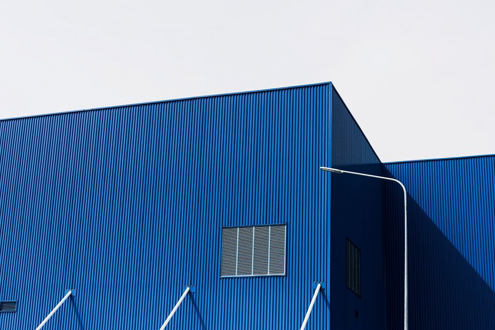 Exterior of a large blue storage building
