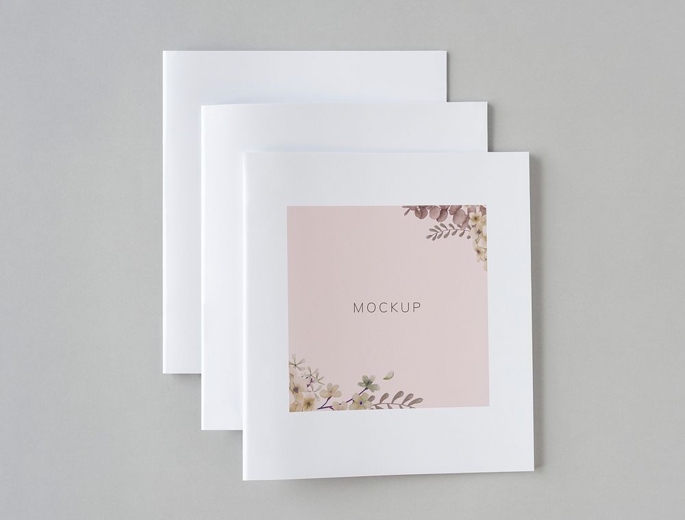 Three stacked white brochure mockups