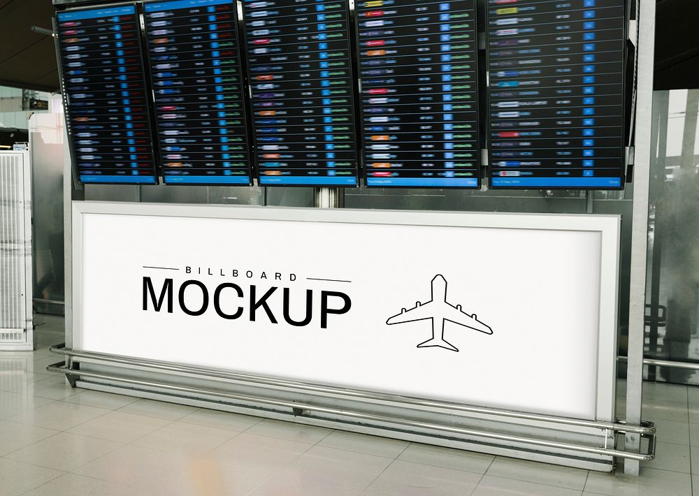 Rectangular billboard mockup under a departure and arrival display board