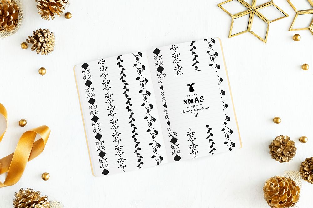 Merry X'Mas and Happy New Year in a notebook mockup
