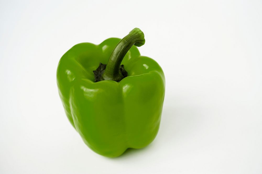 Macro shot of sweet bell pepper isolated on white background
