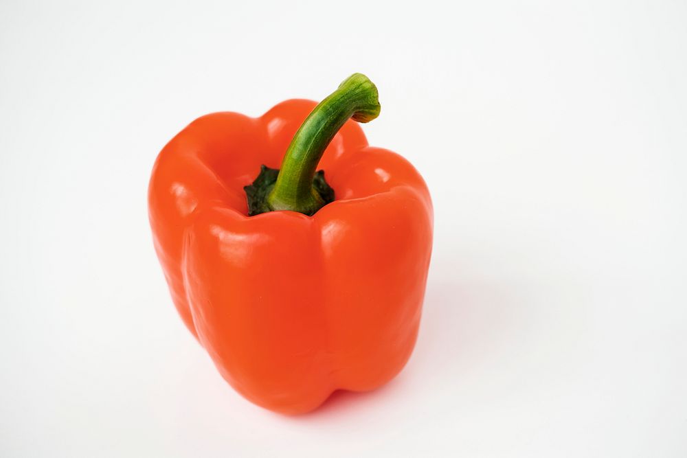 Macro shot of sweet bell pepper isolated on white background