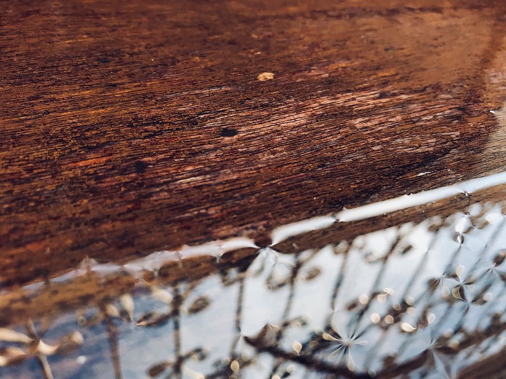 Water on a wooden plank