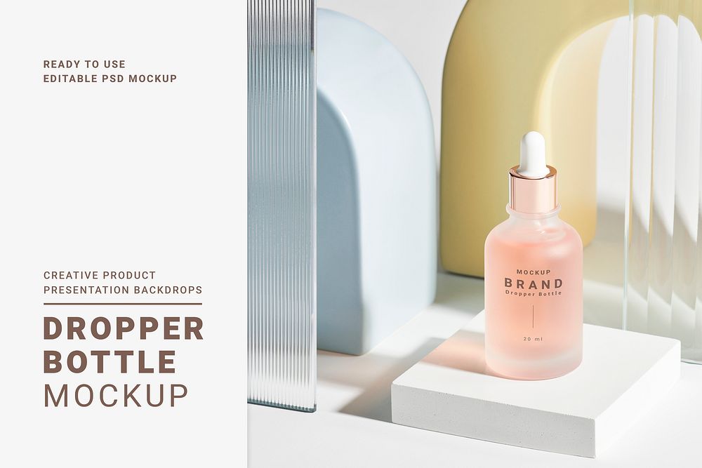 Dropper bottle mockup psd with patterned glass texture product backdrop