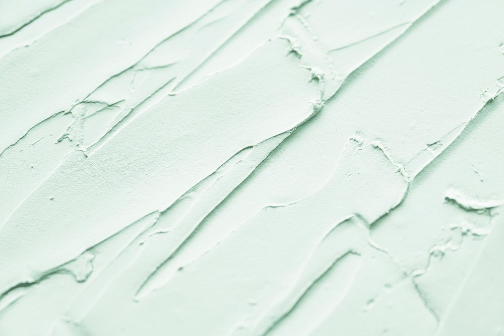 Mint green wall paint textured background