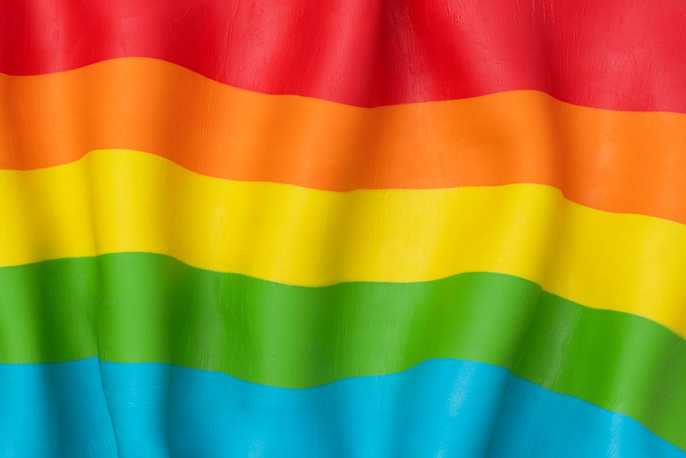 LGBTQ+ rainbow flag background in DIY plasticine clay texture