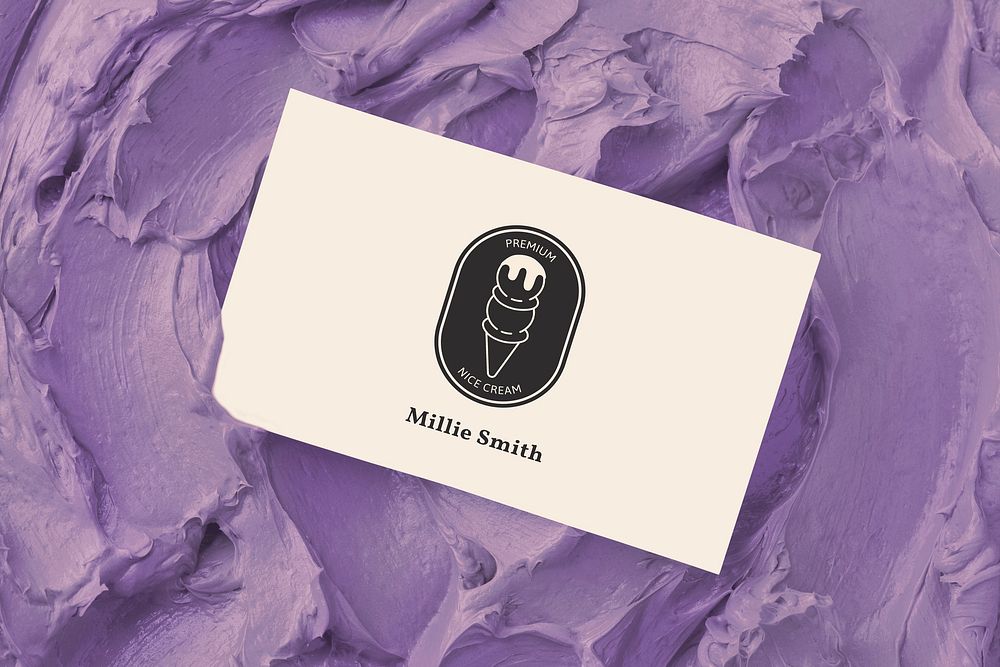 Dessert business card mockup psd on purple frosting texture