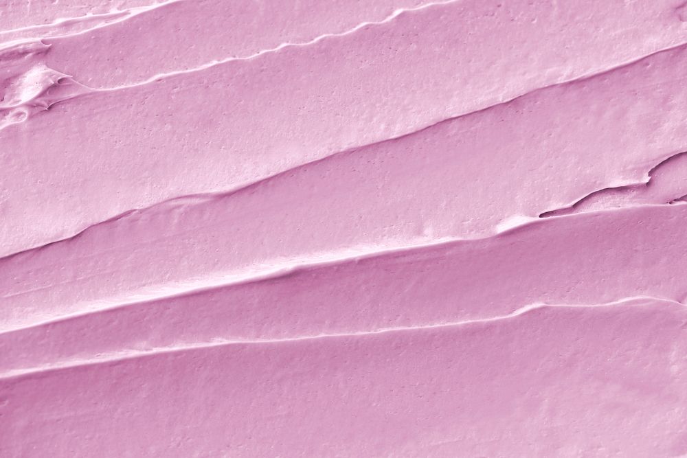 Pink frosting texture background close-up