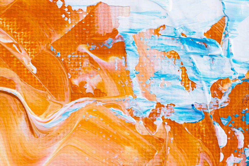 Paint smudge textured background in orange abstract style creative art