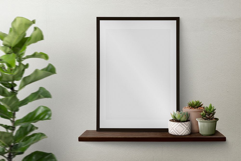 Picture frame psd mockup on a shelf with plants