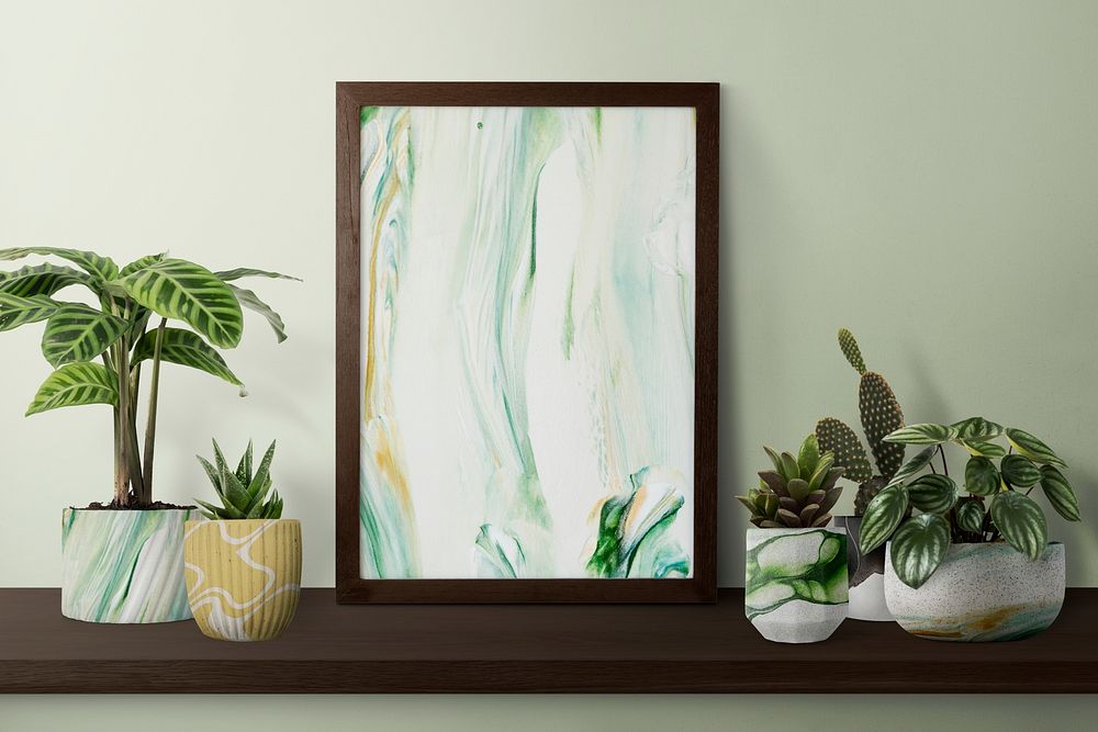 Picture frame psd mockup on a shelf with plants