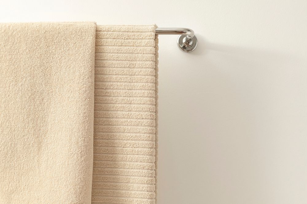 Towel hanging in bathroom, home textile 